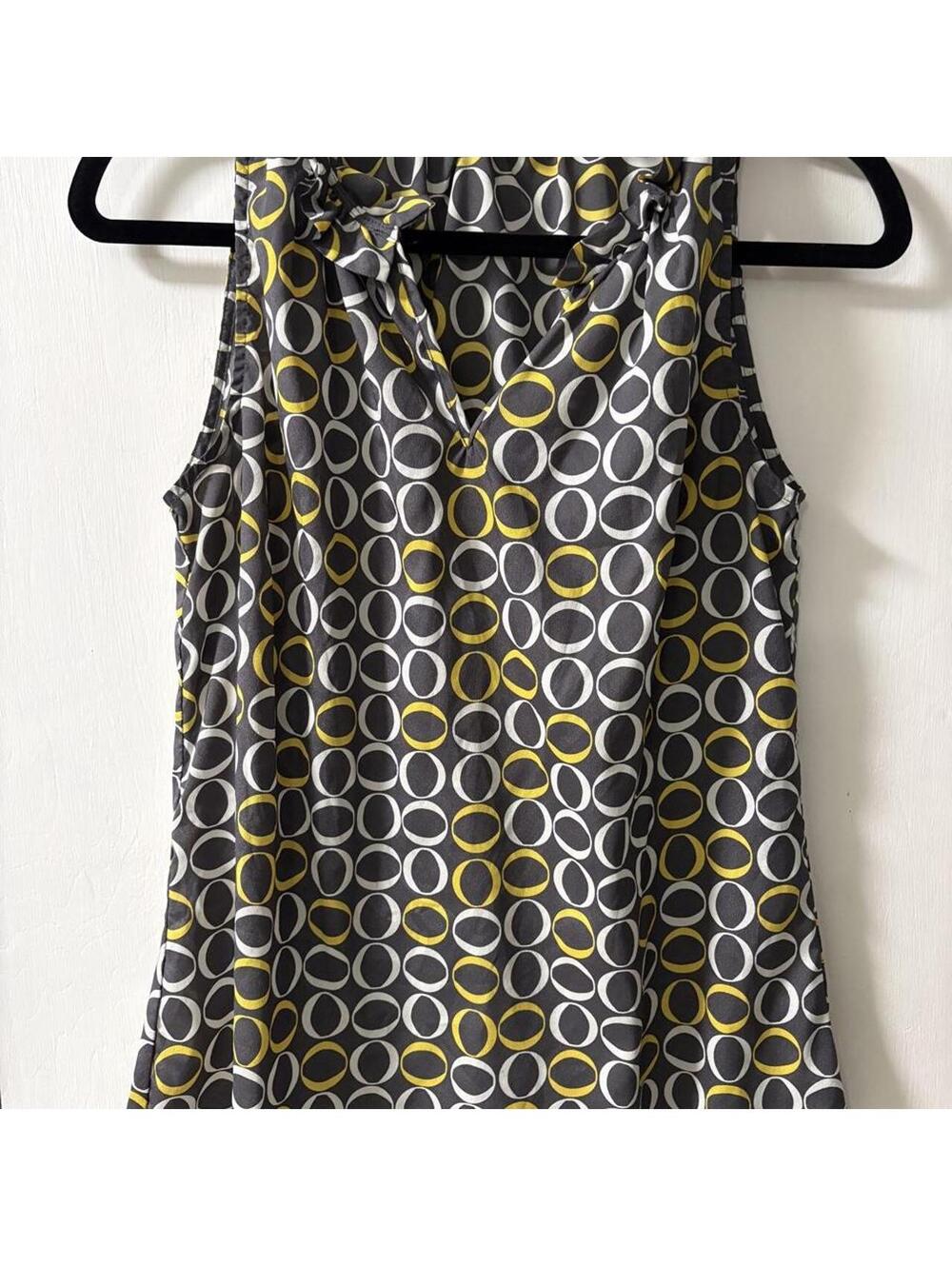 Banana Republic blouse with gray, white, and yellow circular pattern